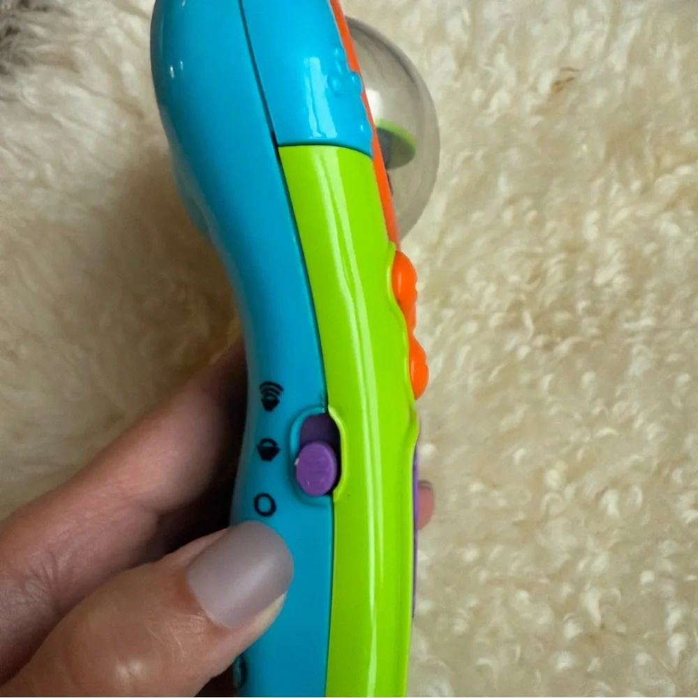 Bright Starts Click & Giggle Baby Remote Control - Lights, Melodies, Giggles!